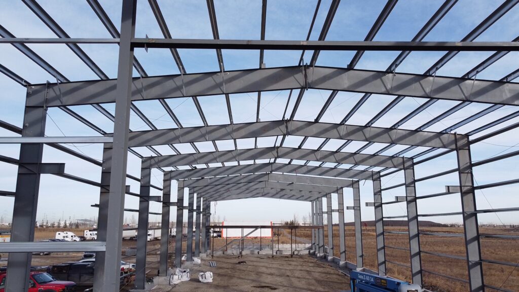 An image of the skeleton of a structural steel building being constructed